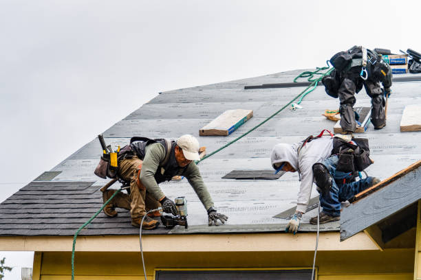 Professional Roofing technician working in Suffern, NY